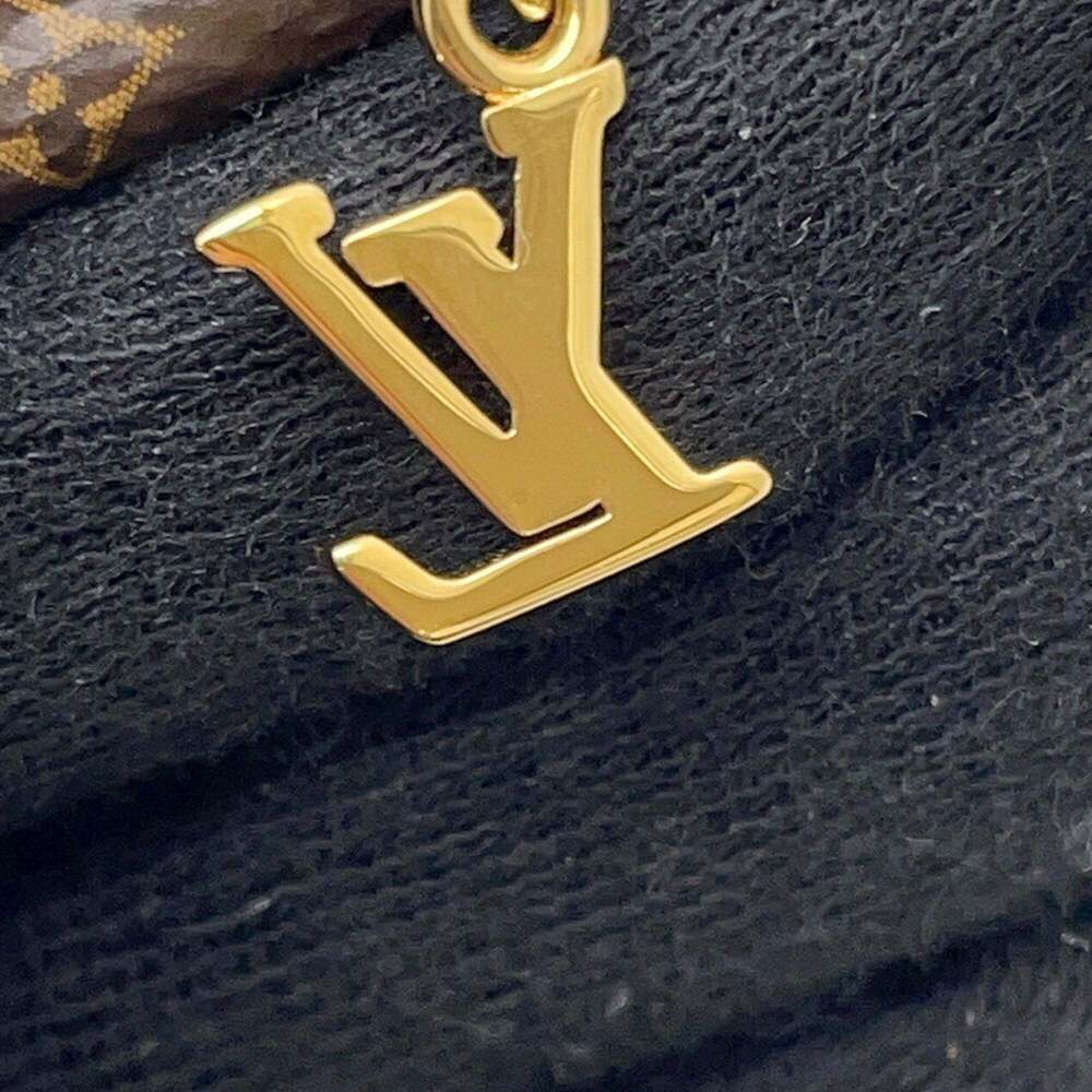 LOUIS VUITTON Brown Monogram Charm Bracelet - Picture 8 of 10